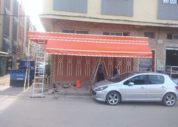 قرار اللون الموحد للواجهات الإشهارية للمحلات يصل مقاطعة بني مكادة  